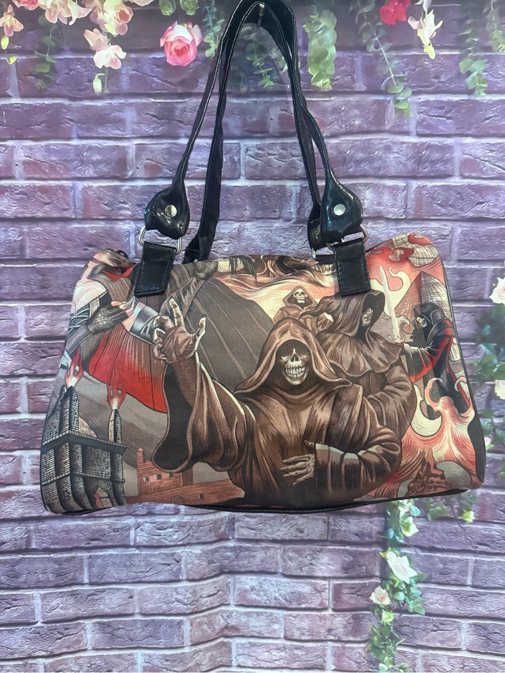Grim Reaper style Graphic Shoulder Barrel Bag in Black and Brown horror skulls